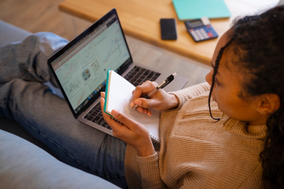 Person editing an AI-generated essay on a laptop